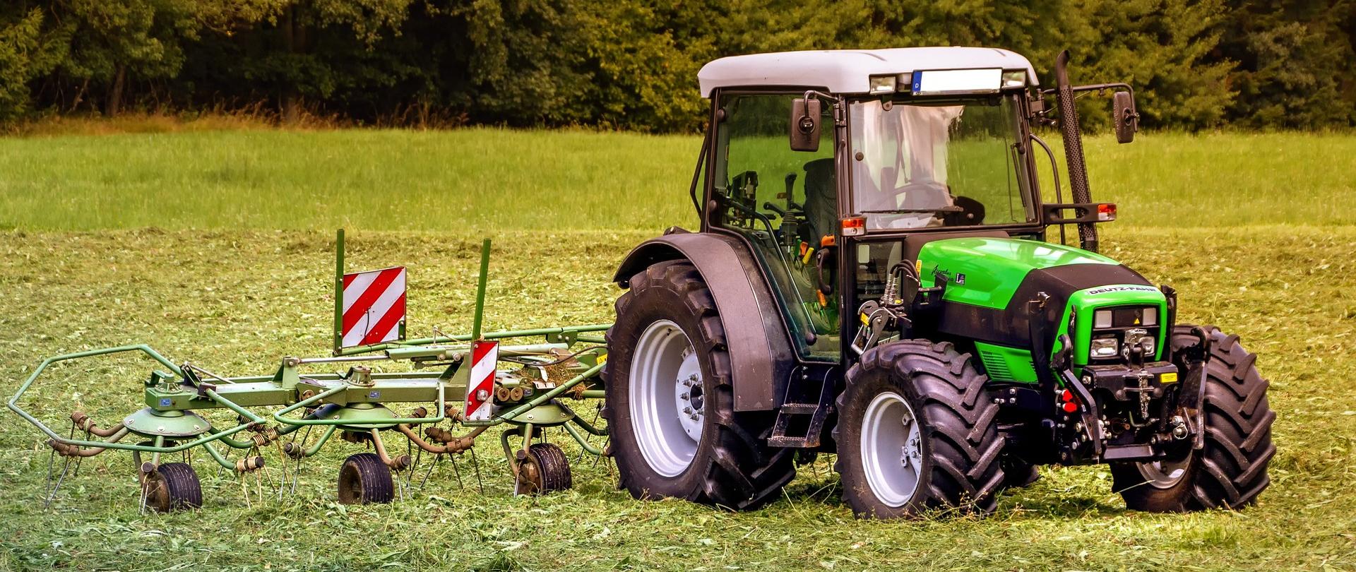 Tractor on a field of grass